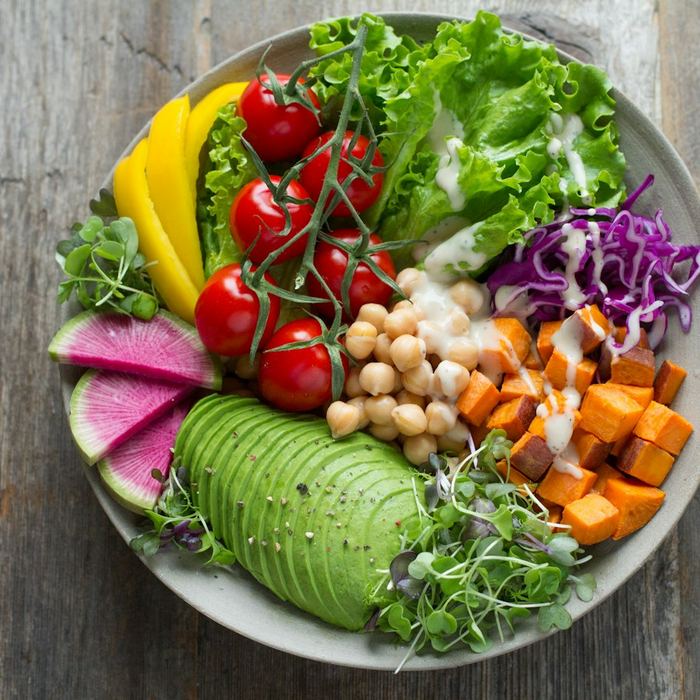 Harissa chickpea bowl with avocado and tomatoes